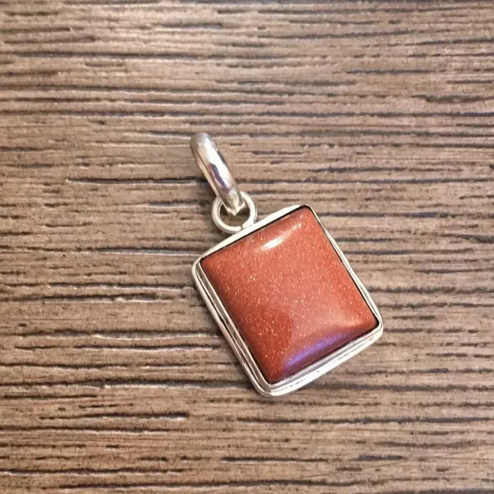 Sterling Silver Goldstone Pendant on Leather Cord